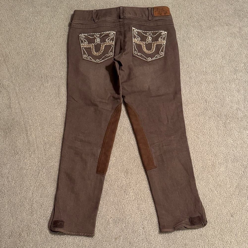 Brown women’s denim breeches with embroidered back pockets